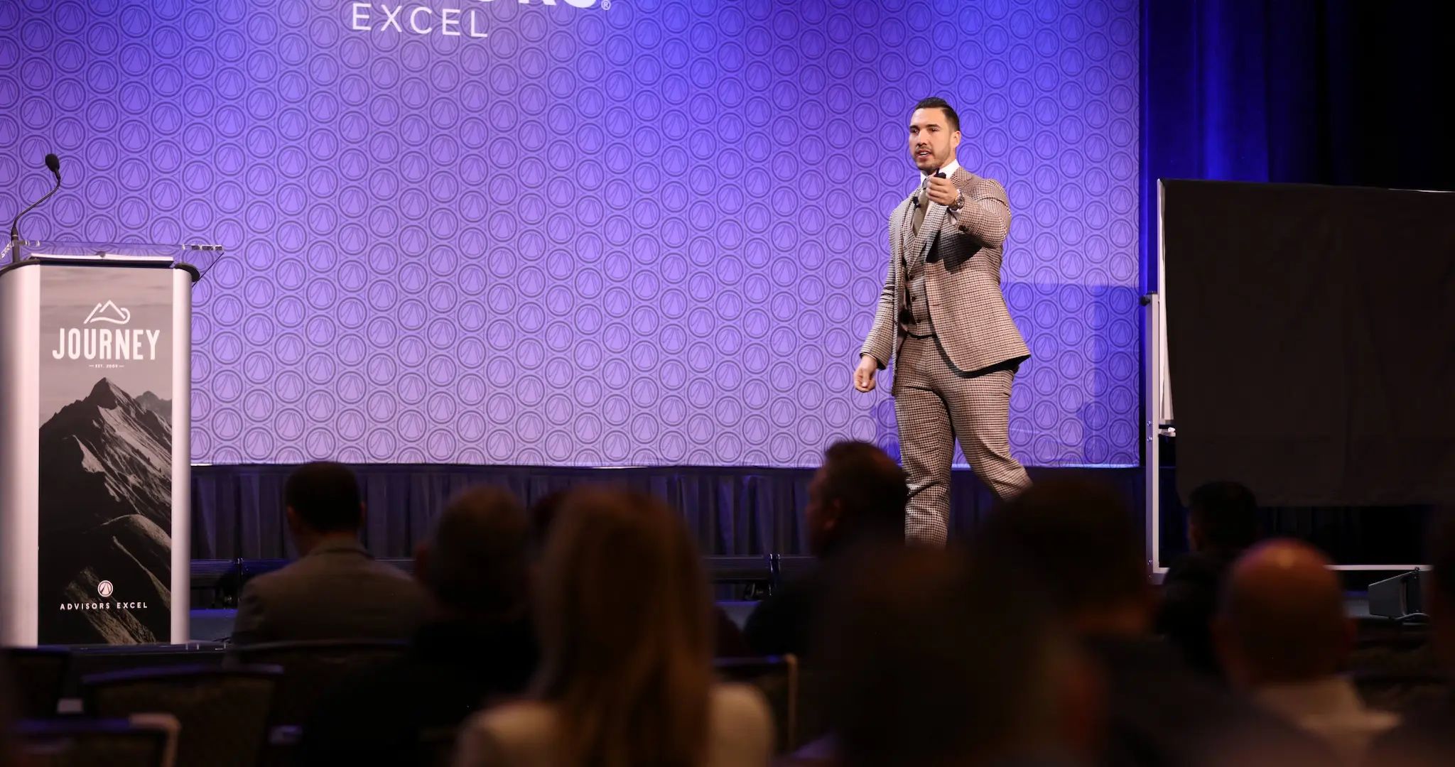 Sebastian Guerra speaking on stage